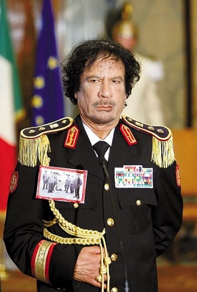 Муаммар Каддафи замахнулся на основной механизм мирового рабства - бумажные деньги